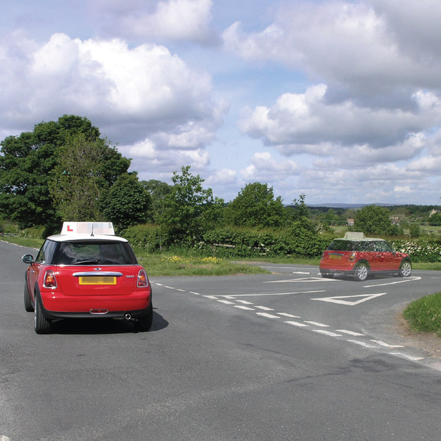 Photograph of a Mini at a Y junction